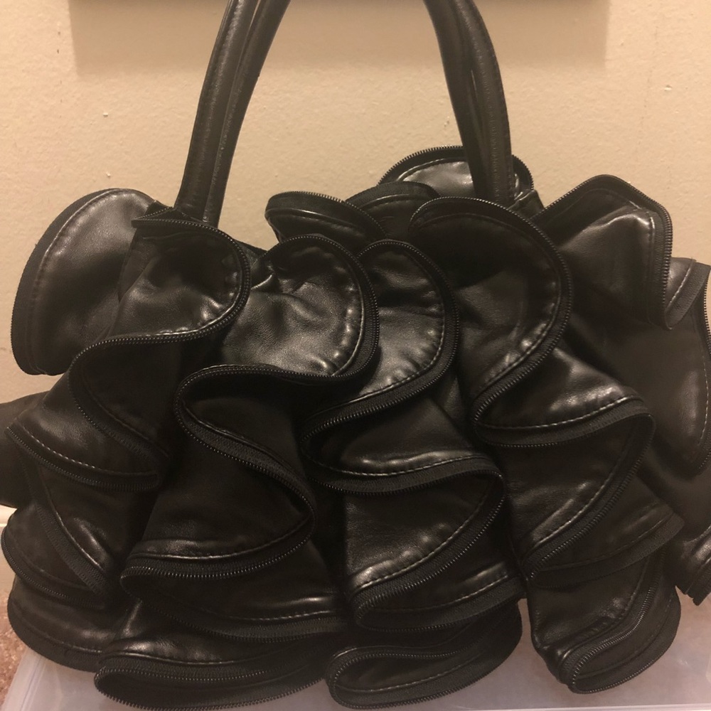 Ruffled zipper purse